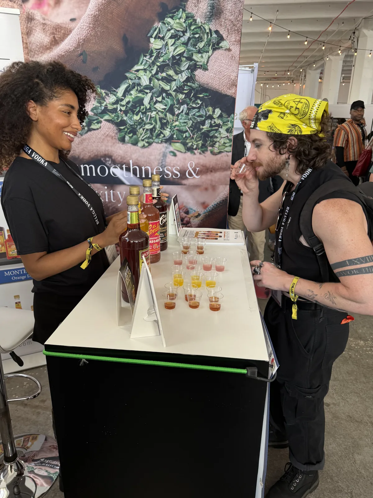 A visitor tasting a sample at the Montebello table